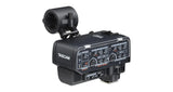 XLR audio adapter for cameras with control knobs and inputs, black housing