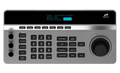 PTZ camera controller panel with labeled buttons, channel keys, and large joystick dial