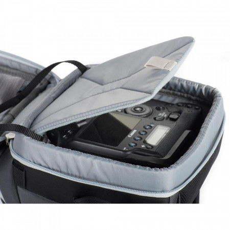 Open top photo holster bag showing interior camera controls and padded divider