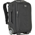 Dark rolling backpack convertible with front zip pocket and caster wheels
