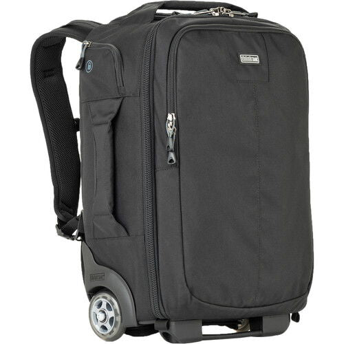 Dark rolling backpack convertible with front zip pocket and caster wheels