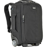 Dark rolling backpack convertible with front zip pocket and caster wheels