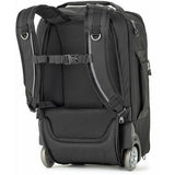 Top and side view of dark rolling backpack with padded shoulder straps and wheels