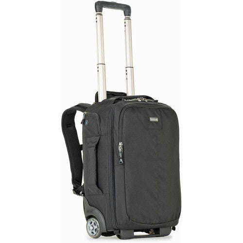 Front view of dark rolling backpack with extended telescopic handle and wheels