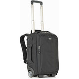 Front view of dark rolling backpack with extended telescopic handle and wheels