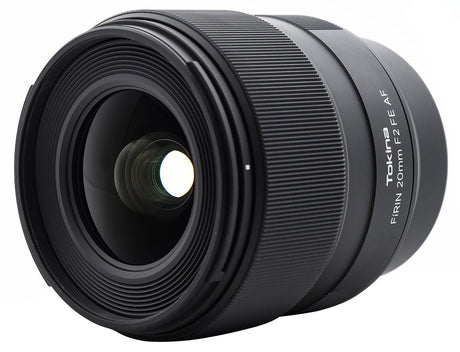 FiRIN 20mm f/2 FE AF lens, angled view showing front glass and ridged focus ring