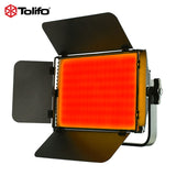 Bicolor/RGB LED light on with warm orange glow and attached barn doors