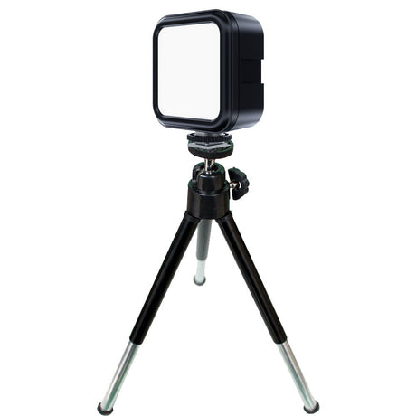 Square LED light on mini tripod with white diffuser, unlit RGB tones