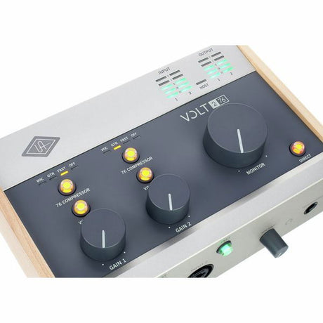 Volt 276 audio interface close-up of gain knobs, compressor switches, and monitor dial