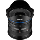 Black camera lens rear view with blue accent ring and engraved lens housing