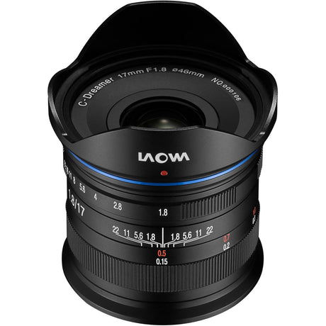 Black camera lens rear view with blue accent ring and engraved lens housing