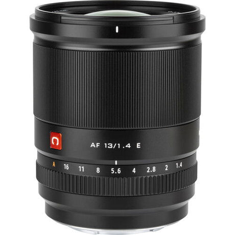 Black 13mm f/1.4 E lens showing aperture ring and depth scale markings