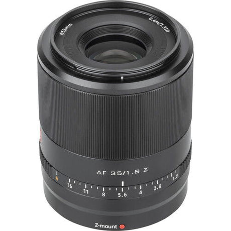 AF 35mm f/1.8 Z lens for Nikon Z, top view with front glass opening, black