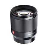 Black 85mm f/1.8 lens front view with engraved markings and front glass