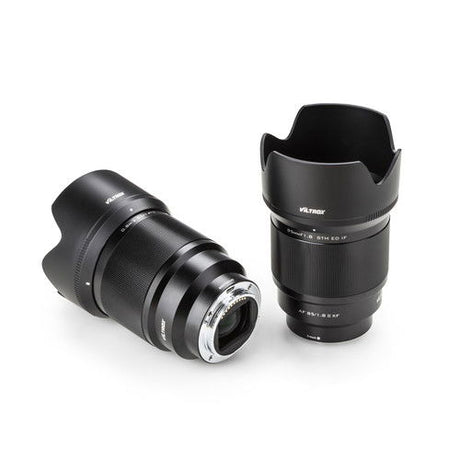 85mm f/1.8 FE II lens for Sony E with lens hood, angled front and rear