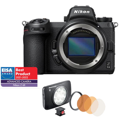 Black mirrorless camera with front lens and viewfinder housing