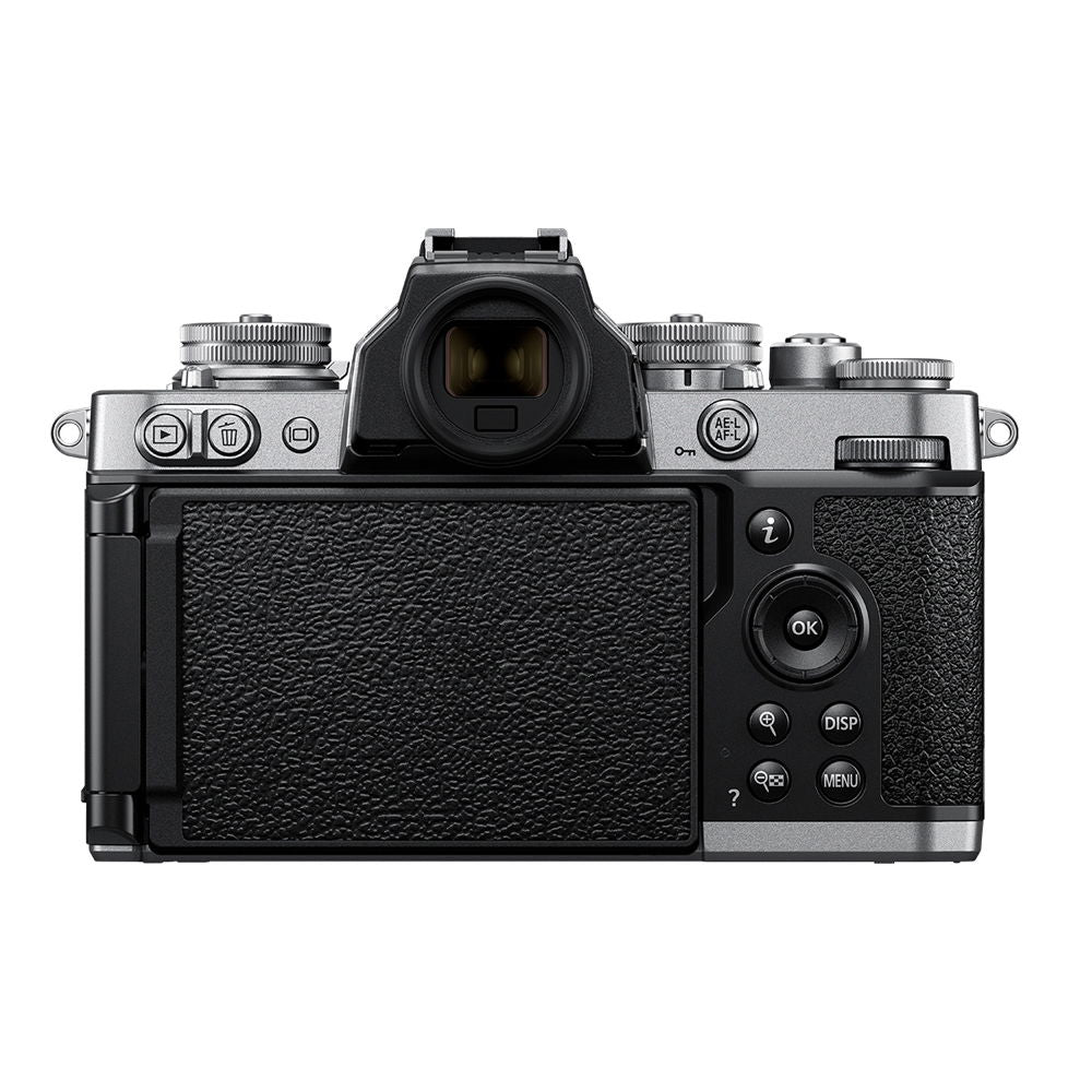 Rear view mirrorless camera kit with textured grip and attached zoom lens