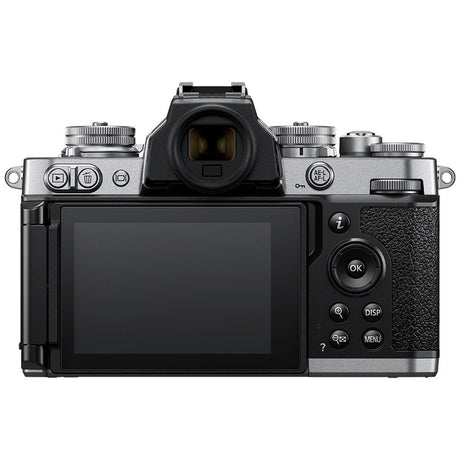 Mirrorless camera with rear LCD screen and attached zoom lens