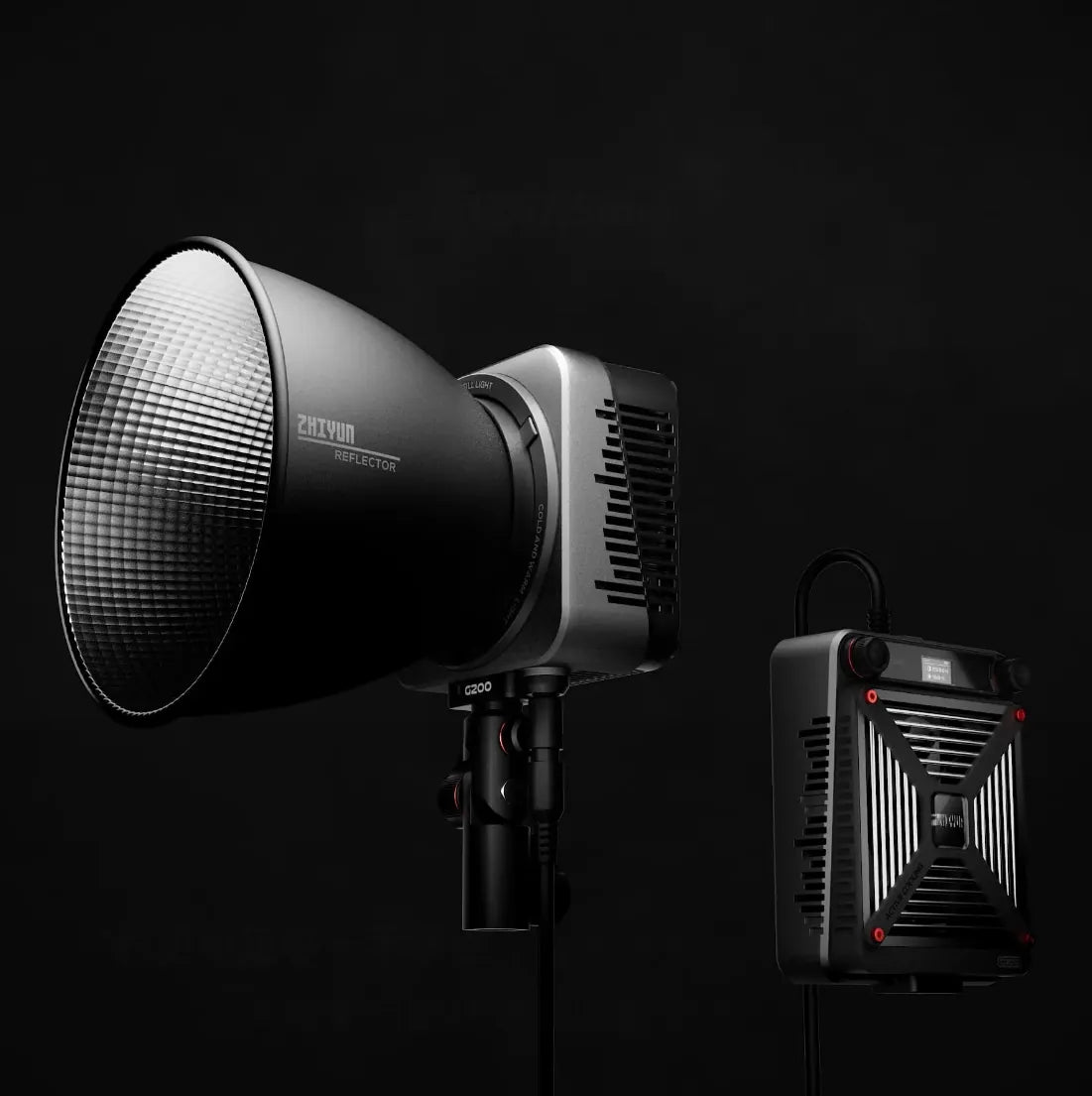 Bi-color LED light on stand with reflector; compact LED panel shown beside it