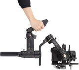 Hand holding and adjusting Crane 3S 3-axis gimbal stabilizer with controls