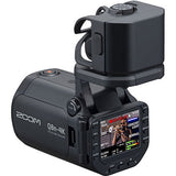 Q8n-4K handheld video recorder with side buttons and rear LCD screen
