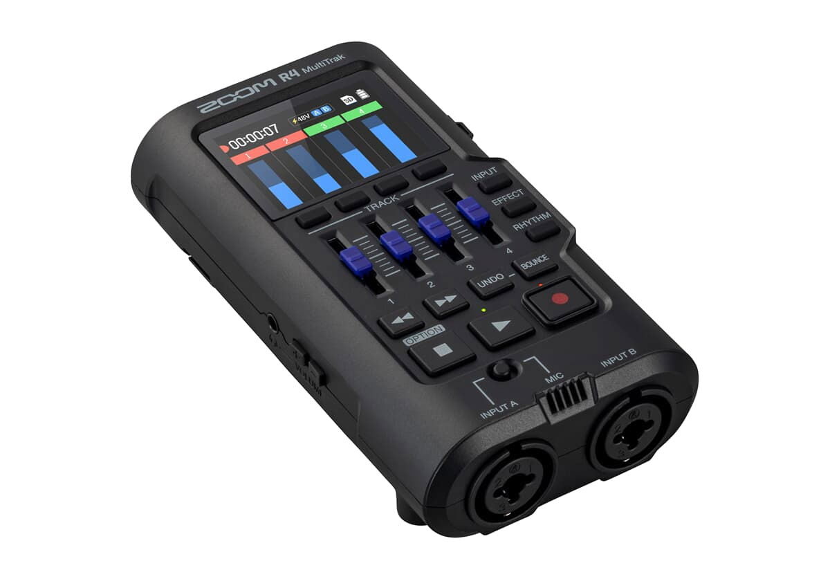Angled Zoom R4 MultiTrak view with LCD, blue faders, and keypad controls